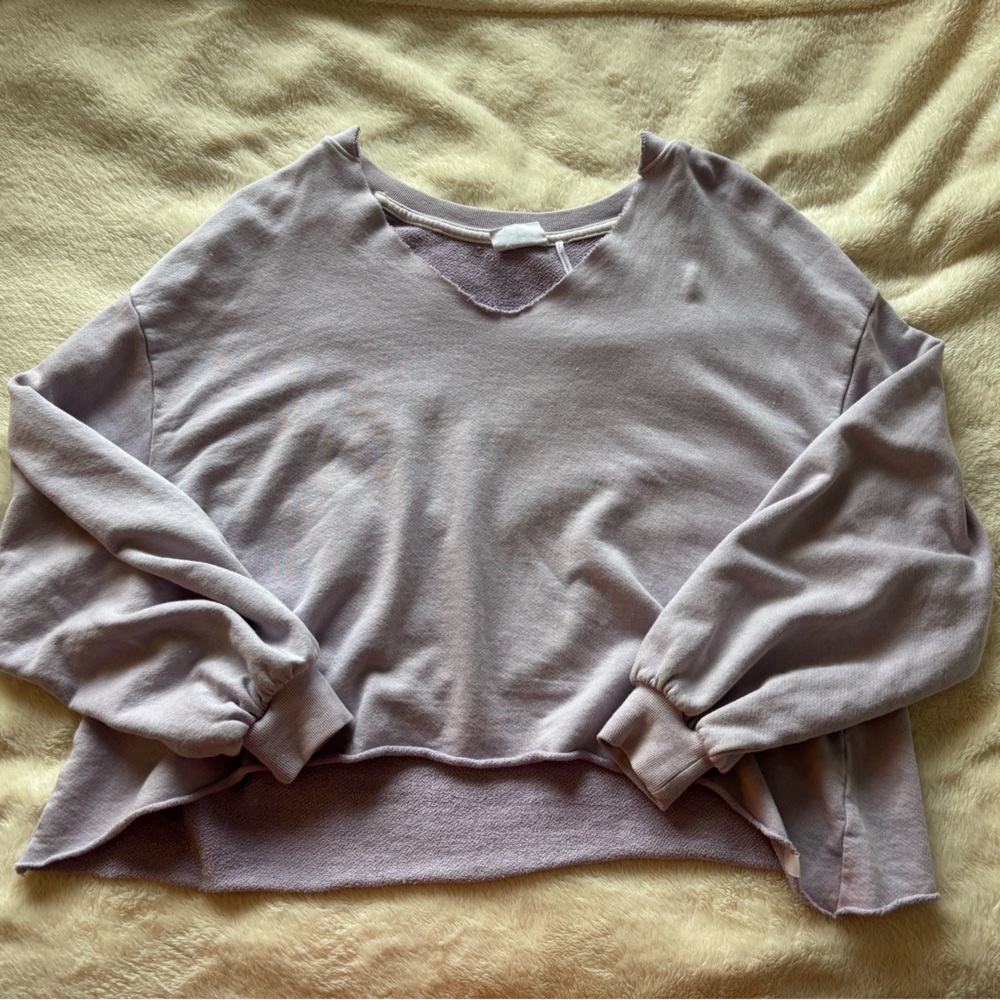 Out from under lavender pullover